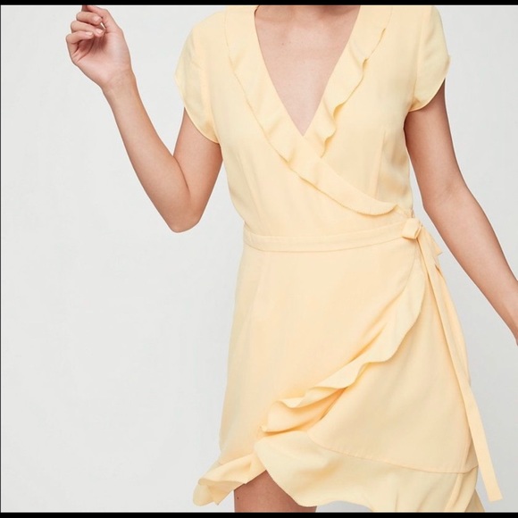 Aritzia Dresses & Skirts - Aritzia Yellow Wrap Mini Dress Size 0